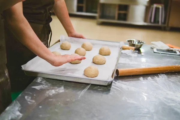 Baking course, kneading dough to smooth