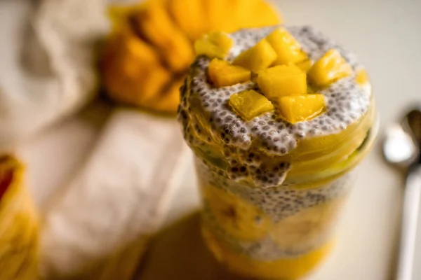 chia pudding with babana,  mango and coconut milk on the breakfa