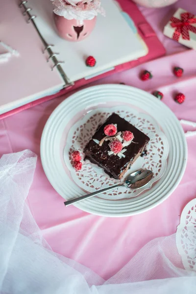 Tasty homemade chocolate birthday cake decorated of some raspber — Stock Photo, Image