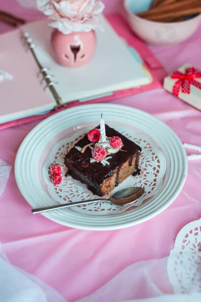 Tasty homemade chocolate birthday cake decorated of some raspber — Stock Photo, Image