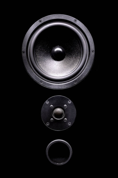 Black speakers on black background