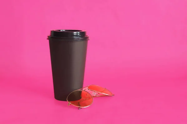 Black Disposable Coffee Cup Stylish Sunglasses Gold Frames Pink Background — Stock Photo, Image