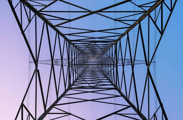 Worm Eye View Power Pylon Beautiful Coloured Sky — стоковое фото