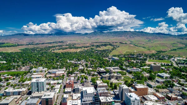 Idaho state capital building aerial view with foothills and larg
