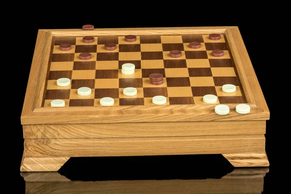 Checkered game board with checkers on it — Stock Photo, Image