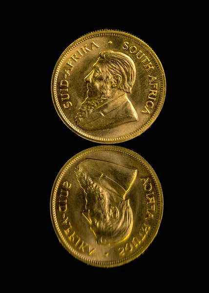 Krugerrand gold coin and reflection — Stock Photo, Image