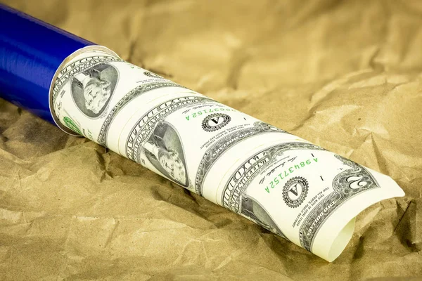 Uncut sheet of money in a blue tube — Stock Photo, Image