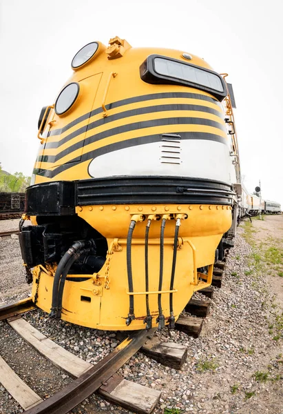 Modern classic train engine on tracks — ストック写真