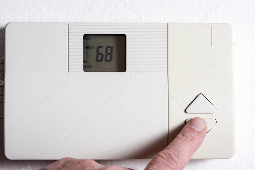 Lowering the temperature on a thermostat