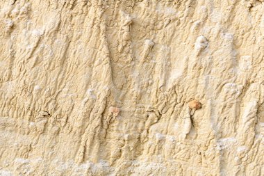 Arkaplan, kırışıklıklar ve kayalarla dokulu sıcak renkler