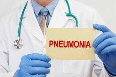 Doktor zatürree işareti ile yakın çekim yapıyor. Koronavirüs salgını sırasında karantina