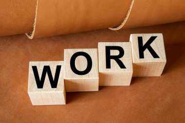 Tahta bloklara yazılmış bir kelime. Deri arkaplan