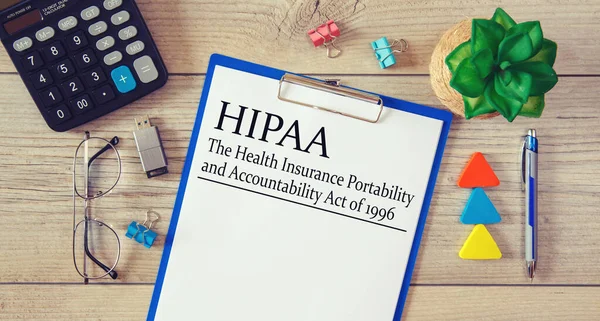 Paper Hipaa Health Insurance Portability Accountability Act 1996 Table Calculator — Stock Photo, Image