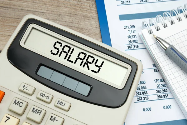 SALARY word on calculator. Business and tax concept.