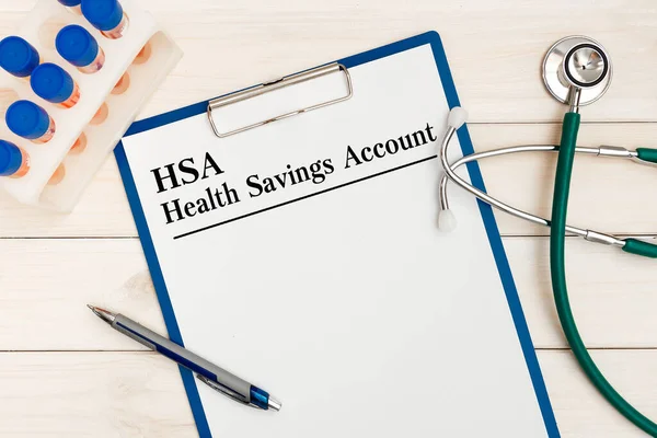 Paper with Health Savings Account HSA on the office desk