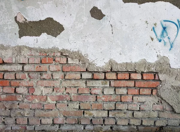 Eski kırık tuğla duvar sıva