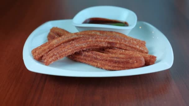 Churros y chocolate caliente, desayuno español — Vídeos de Stock