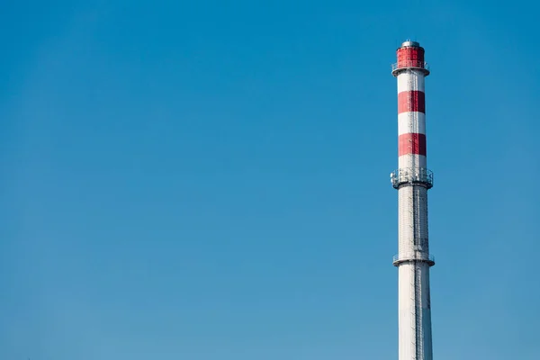 High factory chimney with three red gaps on th e top. not smoking. — Stock Photo, Image