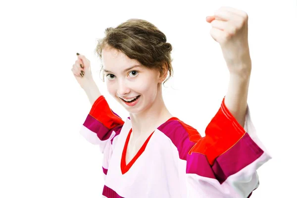 Sport fan in jersey in red, purple colors cheer, celebrating goal. — Stock Photo, Image