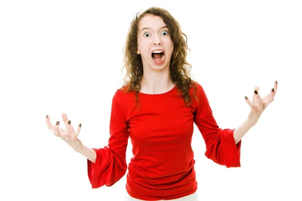 Křičící dívka v červených šatech ukazující gesto agresivního chování — Stock fotografie