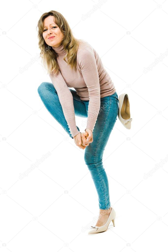 Business woman having uncomfortable high heels - calluses on feet