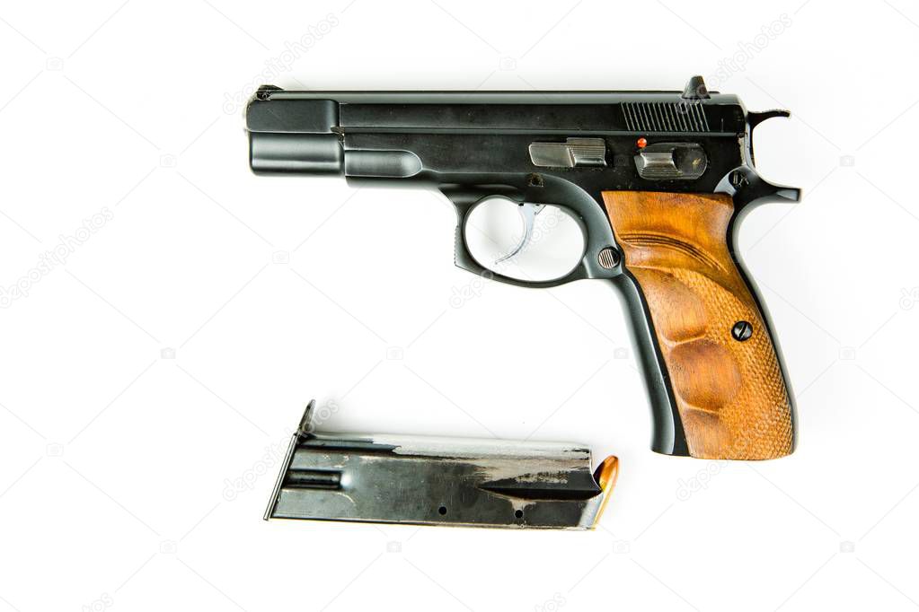 Used black semi automatic pistol and scraped magazine.