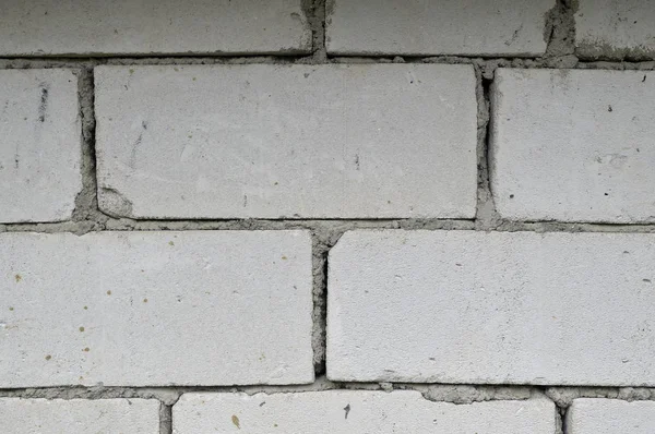 old wall of white bricks for texture, or background