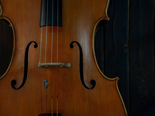 Fragment Van Een Prachtige Cello Viool Een Houten Achtergrond Met — Stockfoto