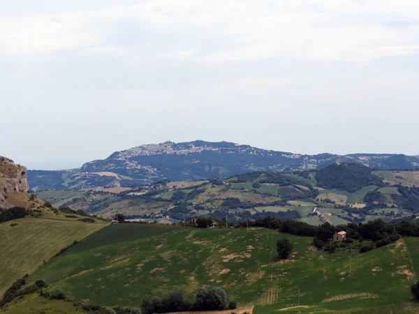 View from the fortress of San Leo to mount Titano and the Republic of San Marino, Italy, Europe.