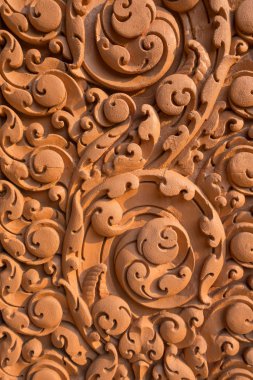 Arka plan kil pigment yapılan sanat oyma.