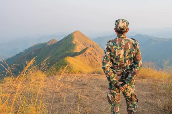 stock image Forester or forest ranger hiking in the mountains at Khao Chang Puak mountain Thailand.