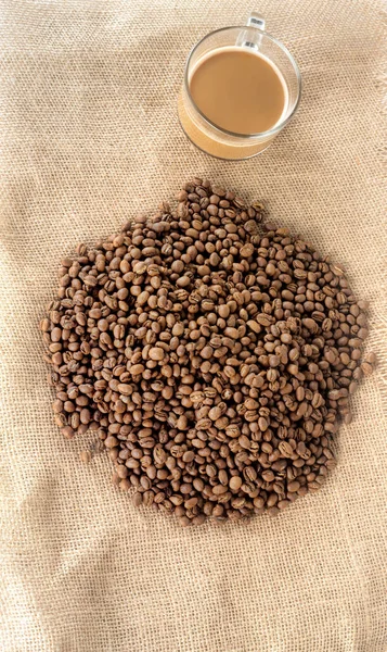 Heap Coffee Beans Cup Coffee Sackcloth Top View — Stock Photo, Image