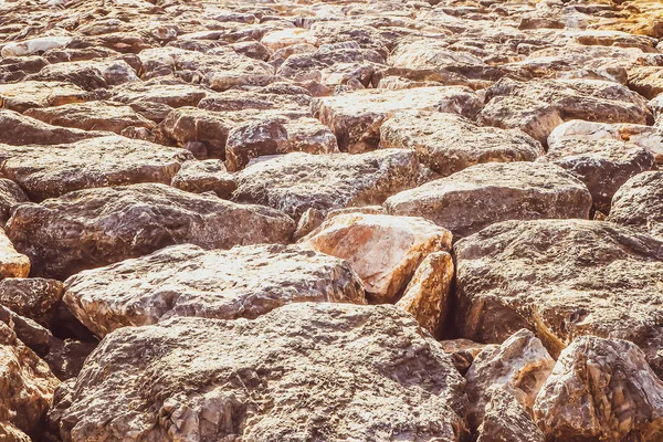 Fels auf dem Beack Nahaufnahme Textur Natur Hintergrundidee — Stockfoto