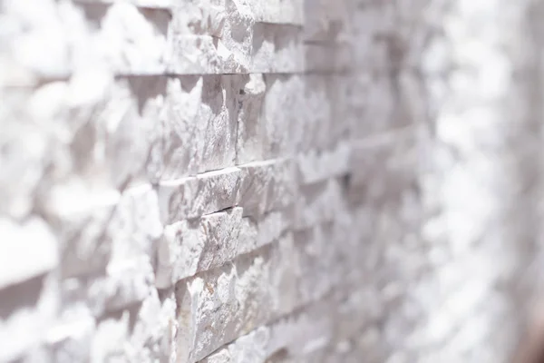Czarno-białe cegły ściany betonu lub kamienia tekstura tło w kolorze białym, niewyraźne — Zdjęcie stockowe