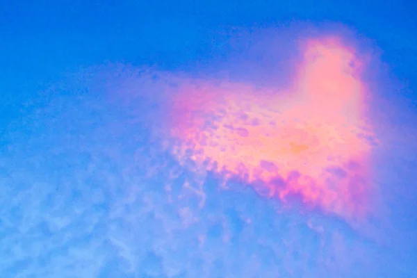 pink heart from cloud beautiful nature express love on the blue sky background
