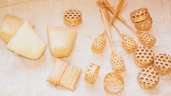 Set of Empty wicker basket on the table with a background in natural linen — Fotografie, imagine de stoc