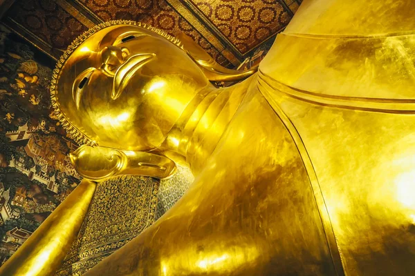 Reclining Buddha (Wat Pho) . Reclining Buddha gold statue. Wat Pho, Bangkok, Thailand