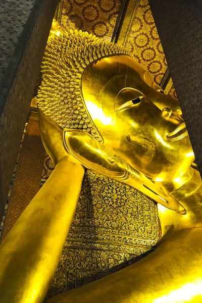Reclining Buddha (Wat Pho) . Reclining Buddha gold statue. Wat Pho, Bangkok, Thailand