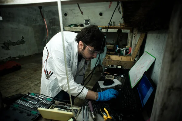 a scientist in a bunker in post-apocalypse