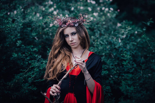 Fairy tale witch in the forest