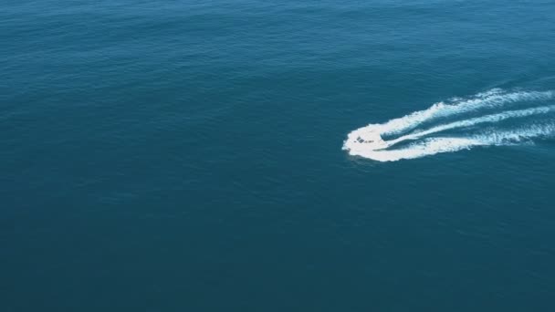 Alone boat sailing in the calm sea and leaving trails. Sozopol, Bulgaria — Stock Video