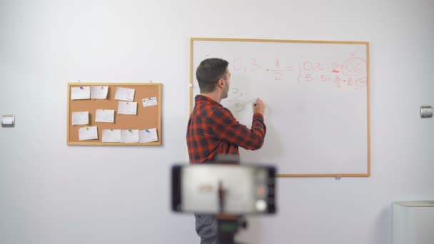 European young Teacher online Live Math Teaching talking on Camera — Stock Video