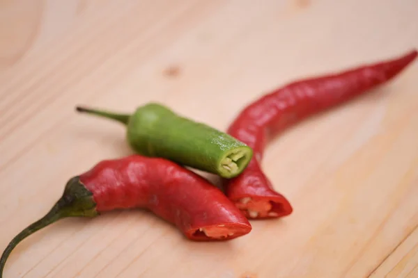 Red Chili Peppers Wooden Background — Stock Photo, Image