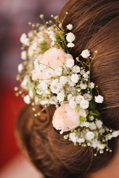 flowers in hair to the bride