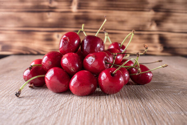  red cherries in the background
