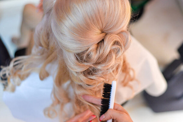 young woman at the hairdressing salon