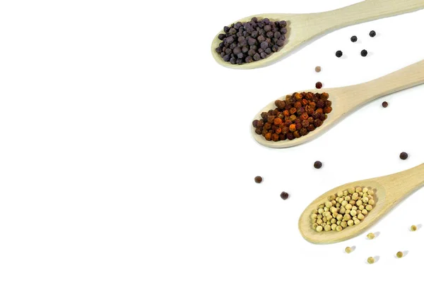 Black Red White Peppercorns Wooden Spoons White Background Isolated Natural — Stock Photo, Image
