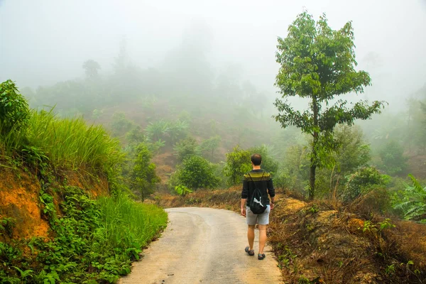 Traveler going in mountains and jungle on the Koh Samui Island, Thailand