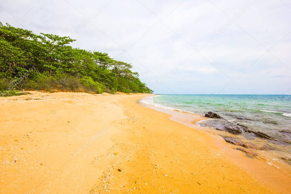 Beautiful tropical beach with palms in Koh Lanta Island, Thailand