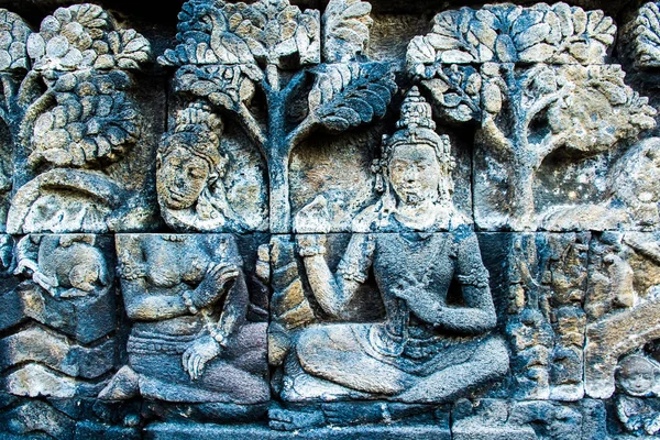 Güzel antik duvar sanat kabartmalı Buda, Budist Tapınağı karmaşık Borobudur, Yogyakarta, Jawa, Endonezya — Stok fotoğraf